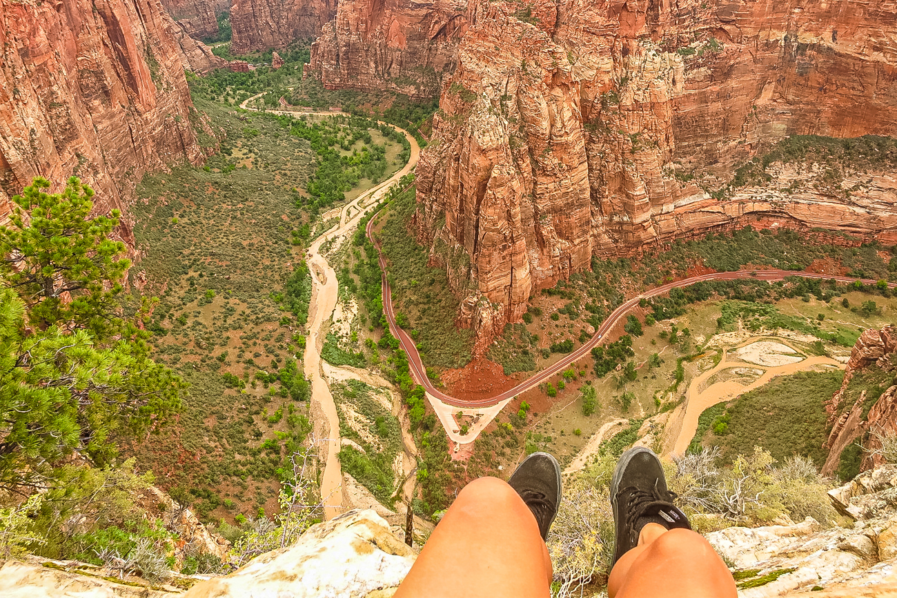 alt=“Sitting-On-Angels-Landing-Zion-National-Park”