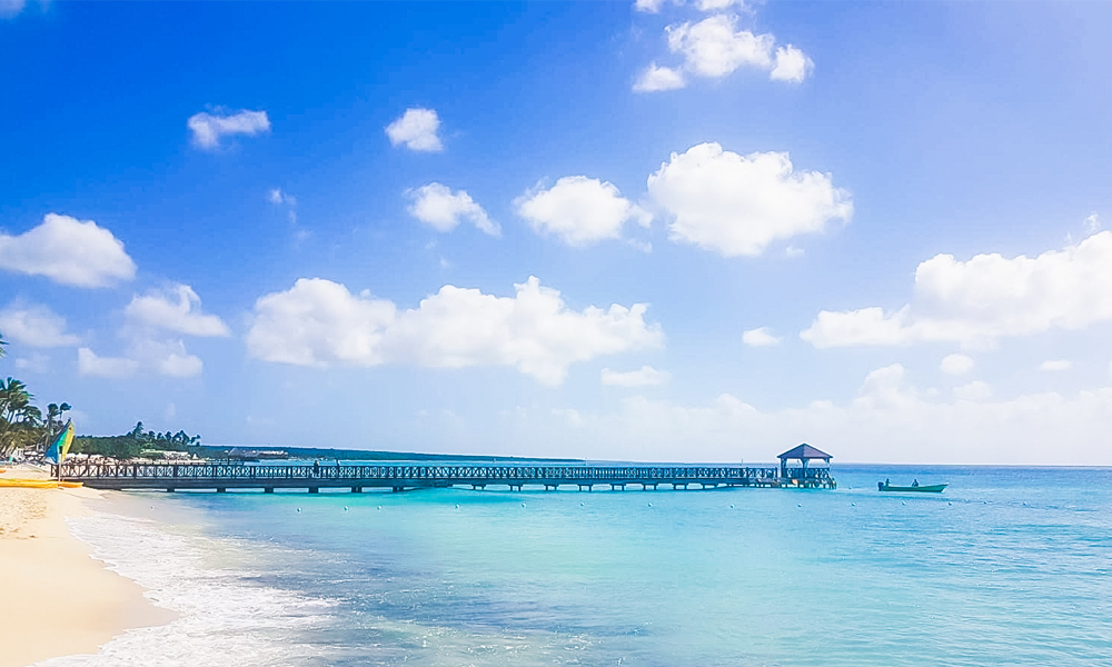 alt="Long pier along the sea at Bayahibe Dominican Republic"
