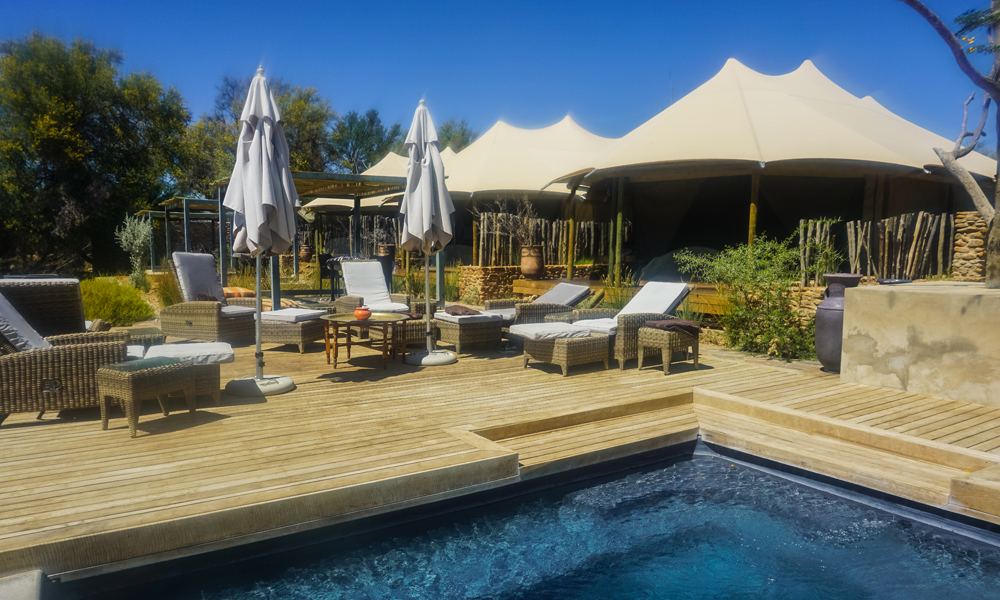 alt="Kuganha tented safari outdoor pool area at Inverdoorn Game Reserve"